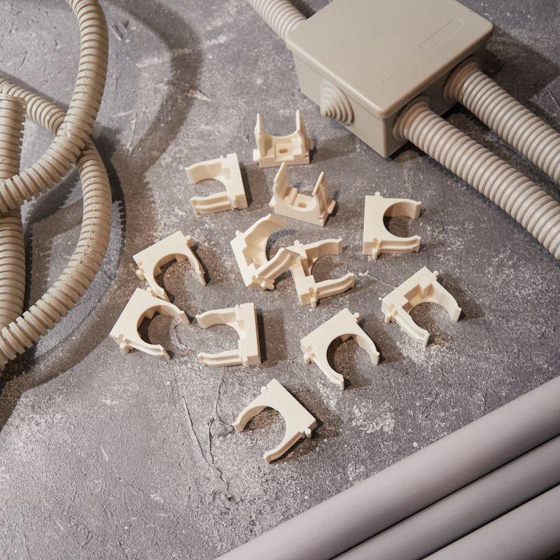 Держатель для труб (клипса) d25мм для монтажного пистолета бел. Rexant 28-0425-3