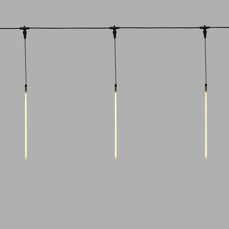 Гирлянда светодиодная "Тающие сосульки" 10шт х 50см шаг 100см 600LED тепл. бел. 24В провод каучук черн. соединяется Neon-Night 256-427