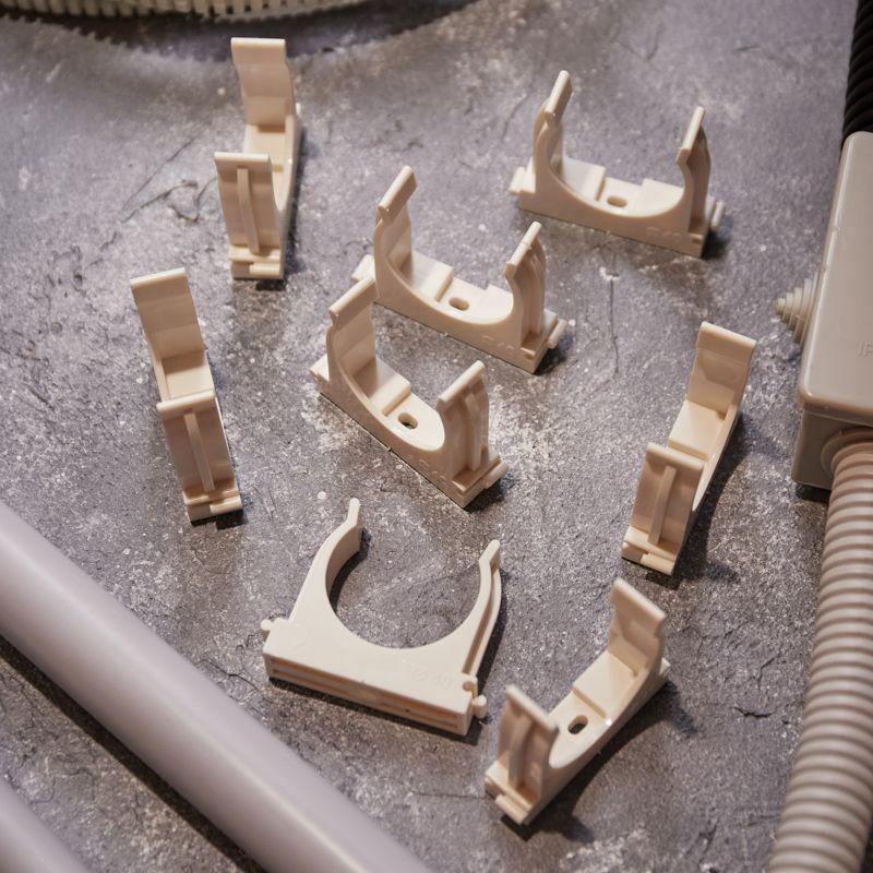 Держатель для труб (клипса) d40мм для монтажного пистолета бел. Rexant 28-0440-3