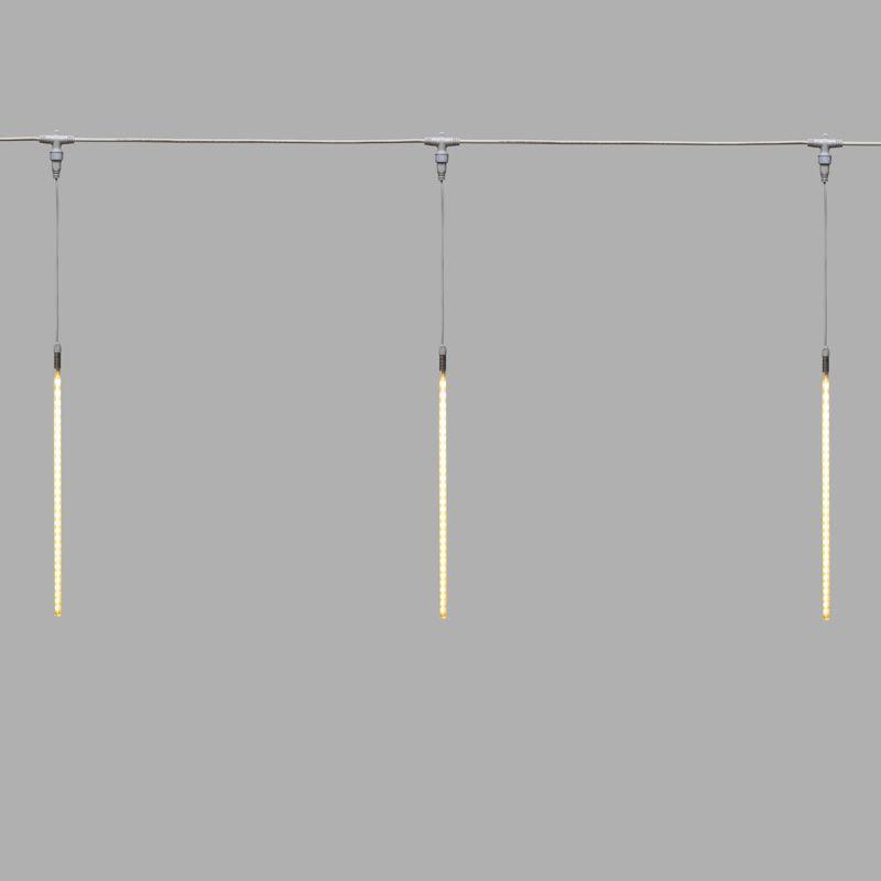 Гирлянда светодиодная "Тающие сосульки" 10шт х 50см шаг 100см 600LED тепл. бел. 24В провод каучук бел. соединяется Neon-Night 256-423