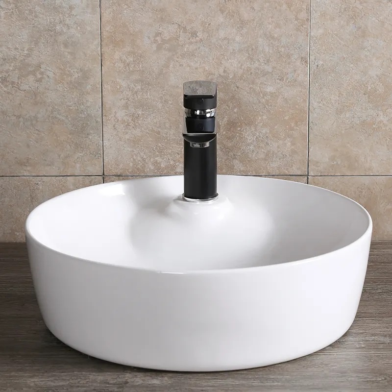 Раковина CR0090 накладная, белая, круглая, с отверстием под смеситель 440х440х130 Ceruttispa