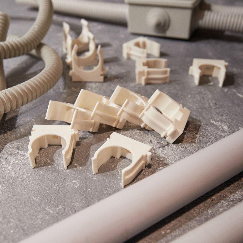 Держатель для труб (клипса) d25мм для монтажного пистолета бел. Rexant 28-0425-3