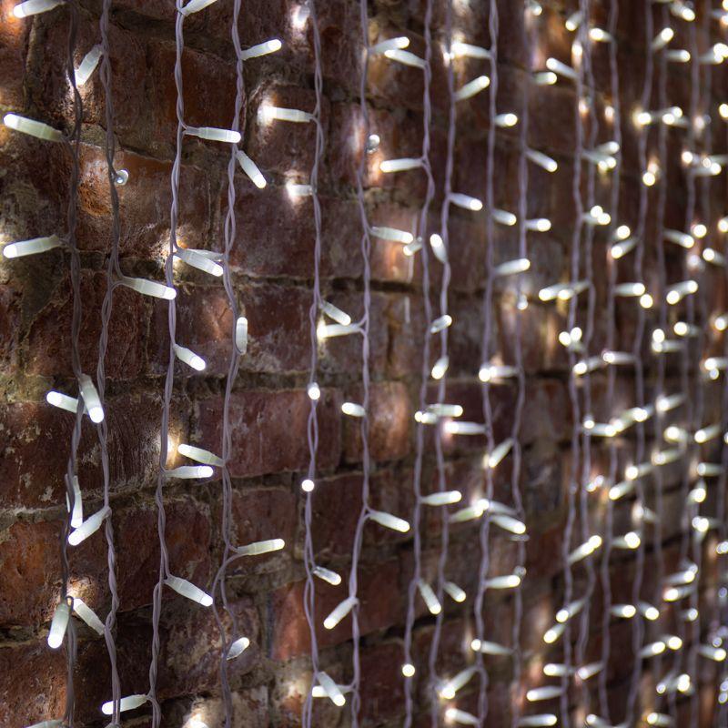 Гирлянда светодиодная "Светодиодный Дождь" 2х3м 448LED бел. 70Вт 230В IP65 эффект мерцания провод прозр. Neon-Night 235-135-6