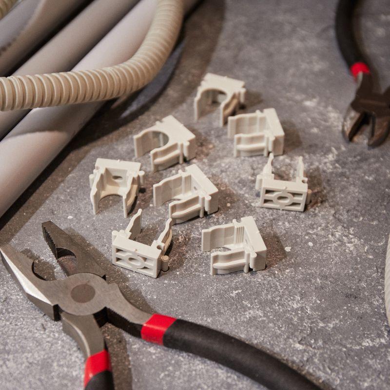 Держатель для труб (клипса) d16мм для монтажного пистолета сер. Rexant 28-0416-1